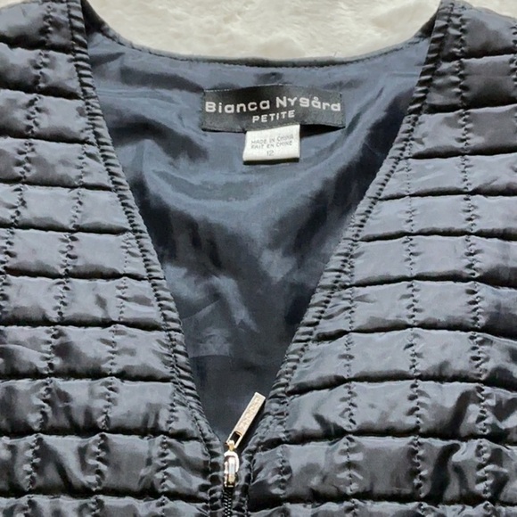 Black Puffer Vest with Horizontal Quilting and Zip Closure - Picture 4 of 5